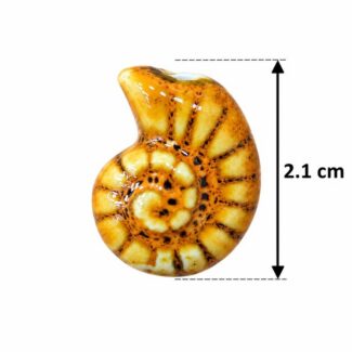 Perle céramique coquillage ammonite jaune et orange moucheté